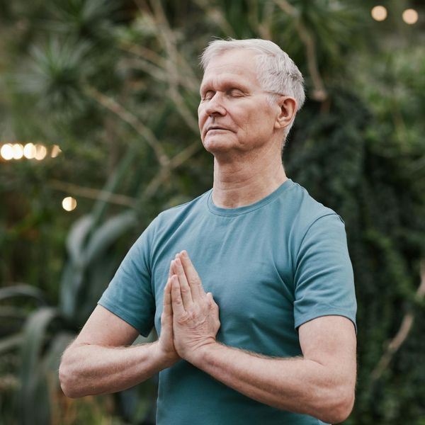 Man meditating after a workout, showing mental clarity and peace.